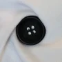 047335